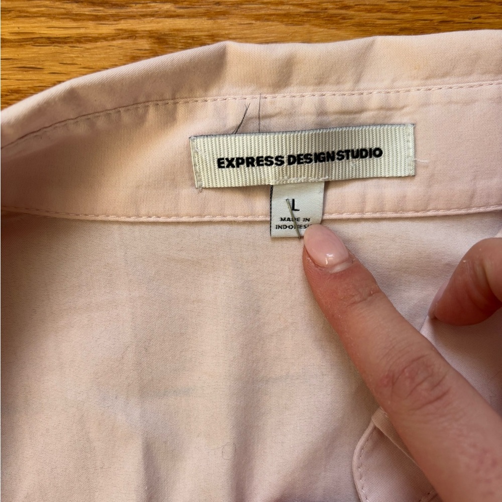 Express Design Studio: Light pink button down with buckle cuff detailing